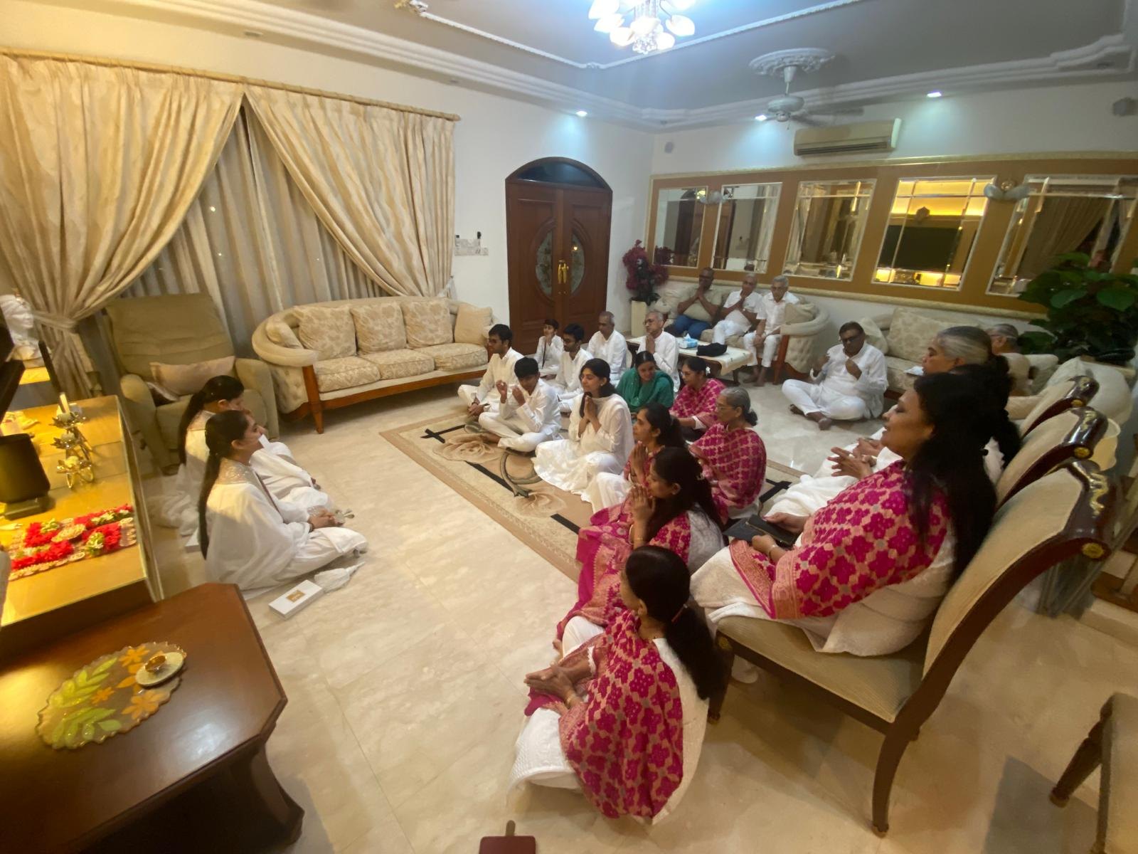 A satsang with the mumukshus in a family home
